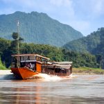 Laos – unterwegs im Holzschiff über den Mekong